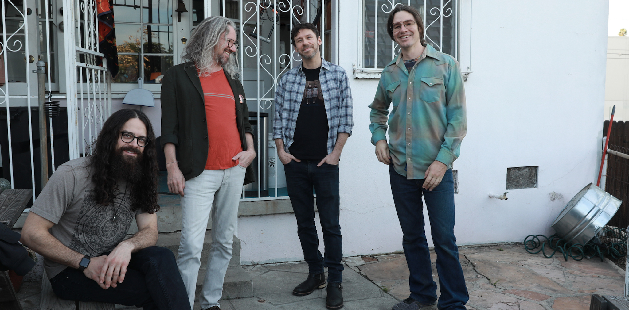 Four men posing